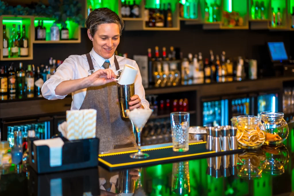 a bartender making a drink